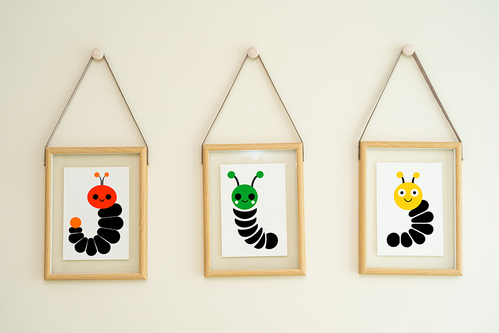 Midwest Modern Simple Graphic Yellow & Black Caterpillar Nursery Art Print - Matte Canvas, Stretched, 1.25"